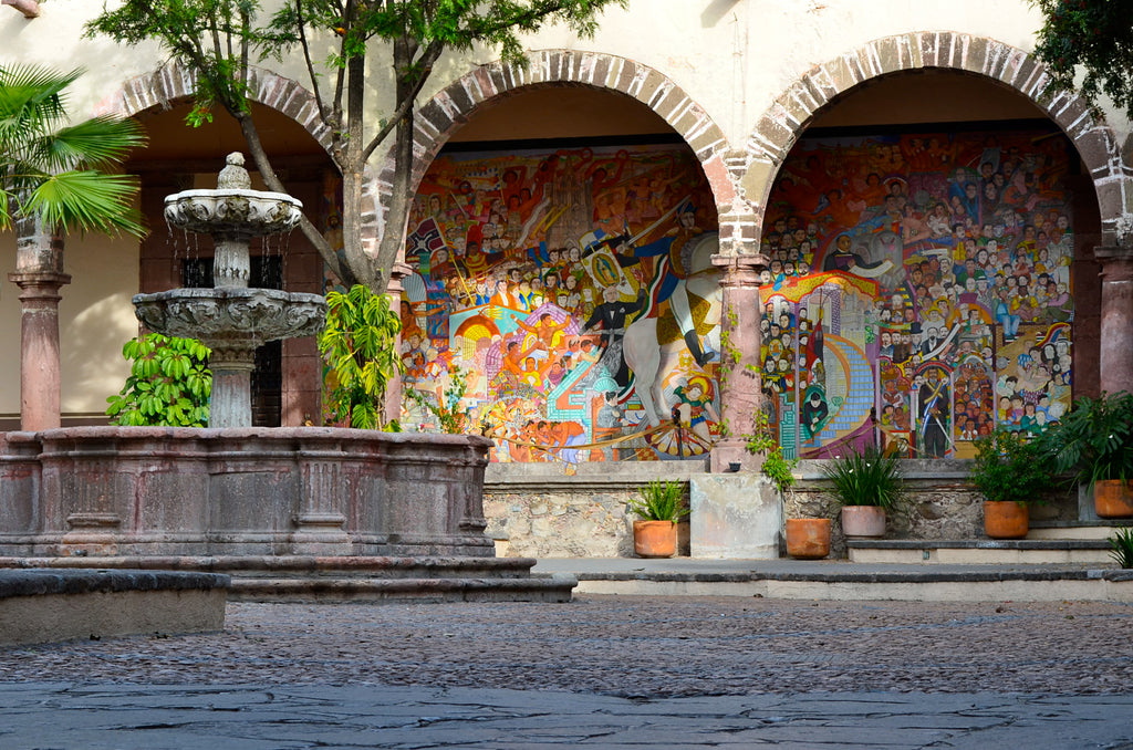 fountain and mural at instituto allende in san miguel de allende mexico
